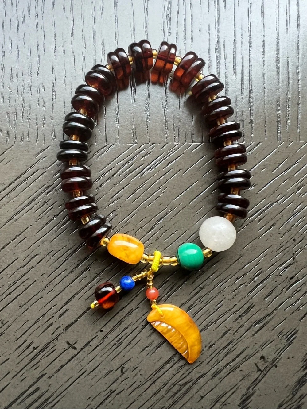 Blood Amber donut bracelet with charm 9mm SIZE 6.5’